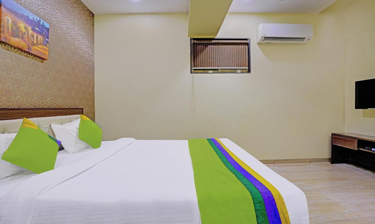 Treebo De Grandeur Anand Nagar Hotel Тане Екстериор снимка