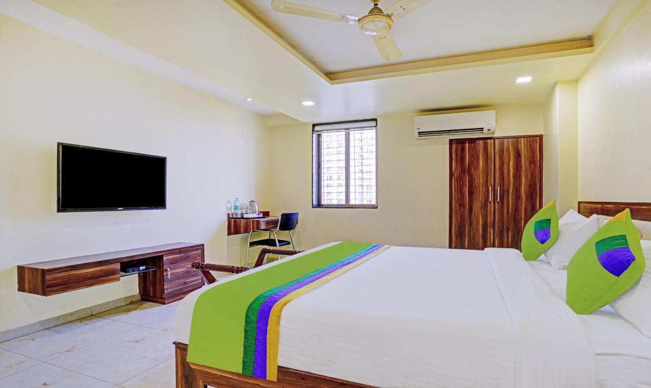 Treebo De Grandeur Anand Nagar Hotel Тане Екстериор снимка