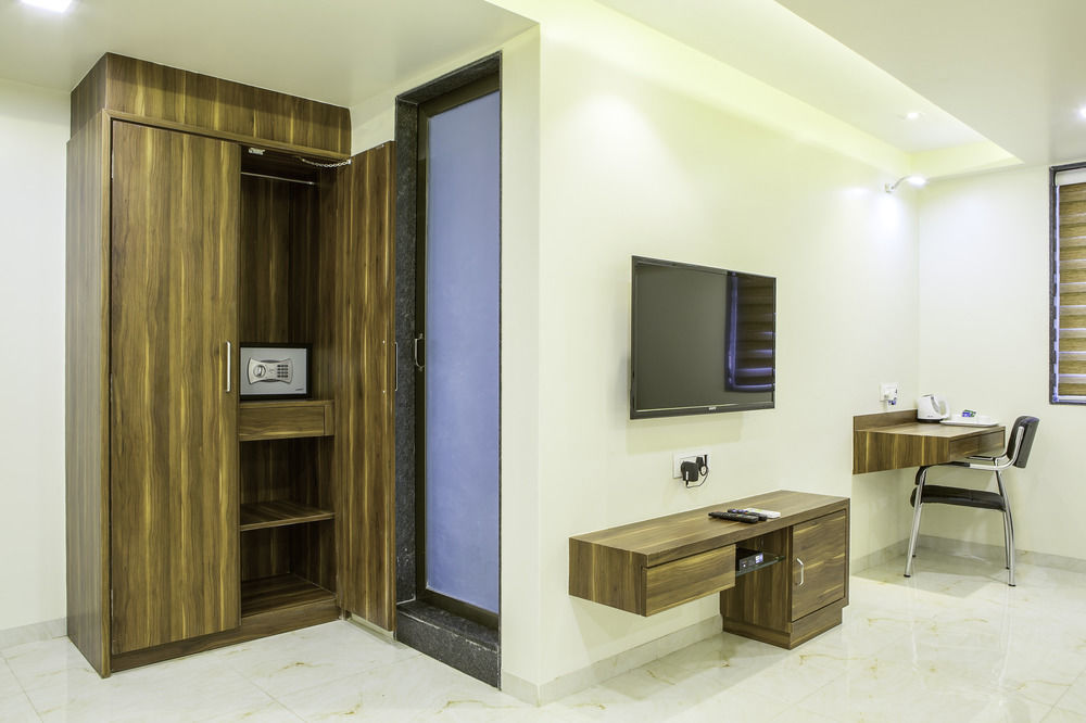 Treebo De Grandeur Anand Nagar Hotel Тане Екстериор снимка