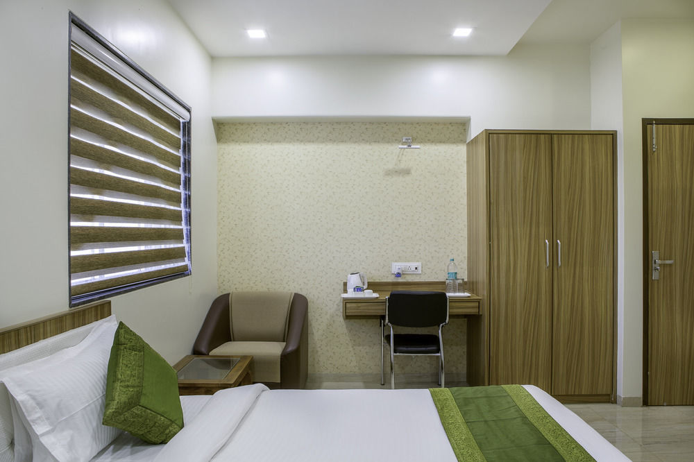 Treebo De Grandeur Anand Nagar Hotel Тане Екстериор снимка