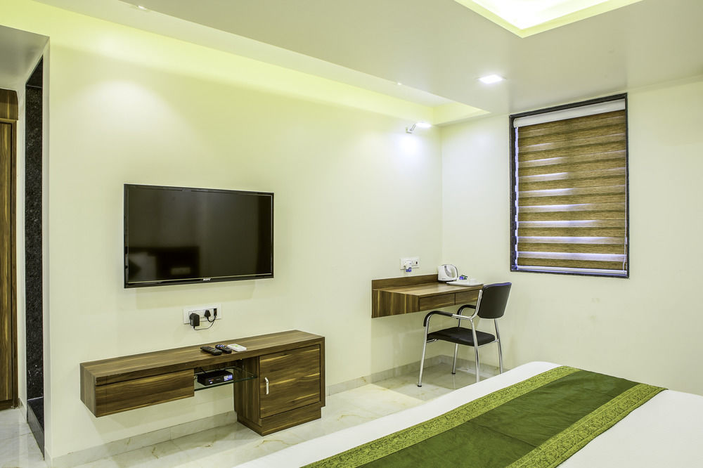 Treebo De Grandeur Anand Nagar Hotel Тане Екстериор снимка