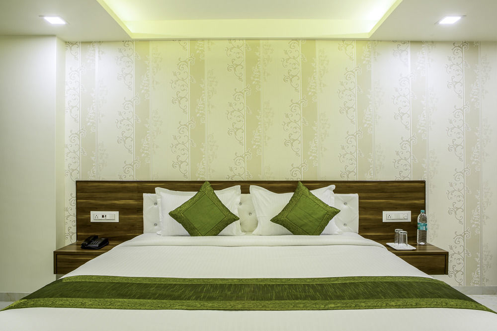 Treebo De Grandeur Anand Nagar Hotel Тане Екстериор снимка