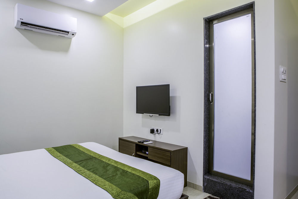 Treebo De Grandeur Anand Nagar Hotel Тане Екстериор снимка