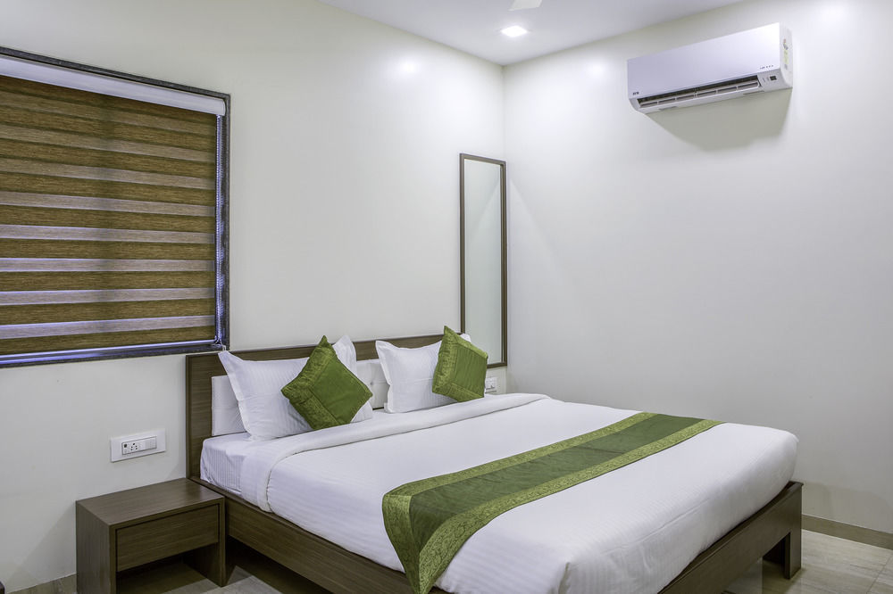 Treebo De Grandeur Anand Nagar Hotel Тане Екстериор снимка