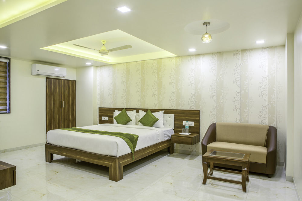 Treebo De Grandeur Anand Nagar Hotel Тане Екстериор снимка